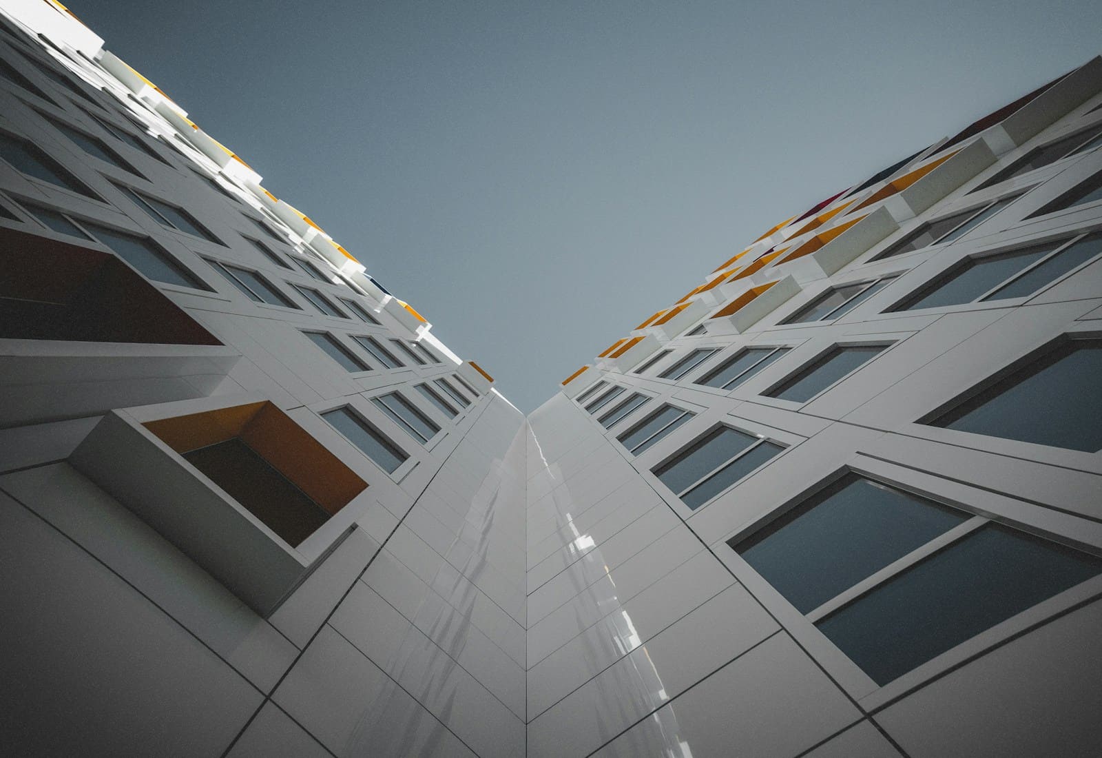 Engineer and homeowner reviewing custom home construction plans